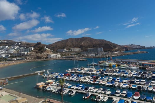 CRAN CANARIA, PUERTO RICO - NOVEMBER 16, 2019:.Marina in Puerto Rico de Gran Canaria. Postcard, spain.