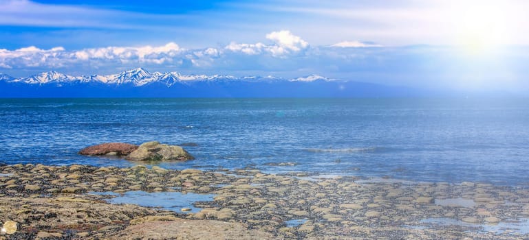 The shore of the Pacific Ocean at low tide and in soft diffused sun light
