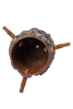 Closeup of an antique cast-iron Christmas tree holder in the shape of a pine cone for attaching the Christmas tree to the rotating Christmas tree stand. Clipping path. Macro.