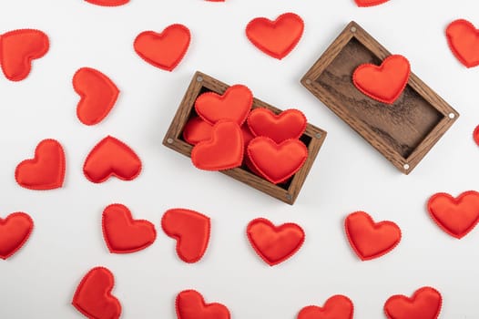 Valentine day white wood background with gift box with red hearts. Valentines day or love concept, copy space