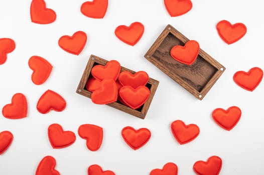 Valentine day white wood background with gift box with red hearts. Valentines day or love concept, copy space