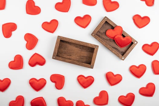 Valentine day white wood background with gift box with red hearts. Valentines day or love concept, copy space