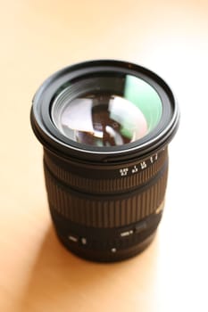 The closeup of the camera lens on the table