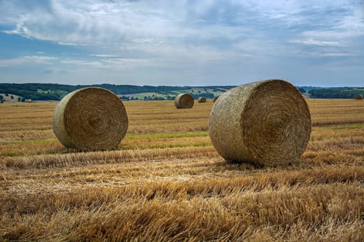 Huge bales of hay in the stubble, Ostrzyca, Lubelskie, Poland