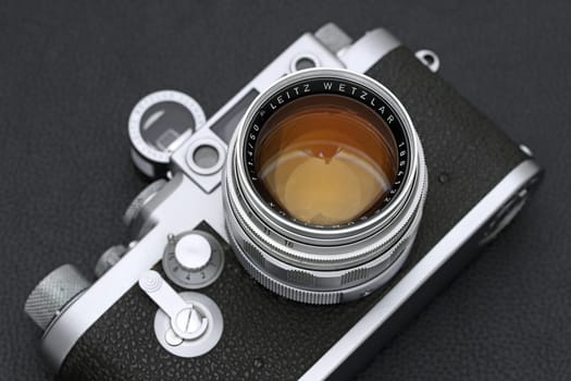 Kagawa, Japan - February 27, 2022: Leica ⅢG rangefinder camera with Leitz 50mm f1.4 Summilux L-mount lens. Vintage collectible classic lens concept.