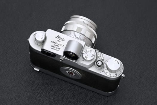 Kagawa, Japan - February 27, 2022: Leica ⅢG rangefinder camera with Leitz 50mm f1.4 Summilux L-mount lens. Vintage collectible classic lens concept.