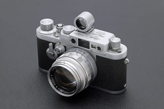 Kagawa, Japan - February 27, 2022: Leica ⅢG rangefinder camera with Leitz 50mm f1.4 Summilux L-mount lens. Vintage collectible classic lens concept.