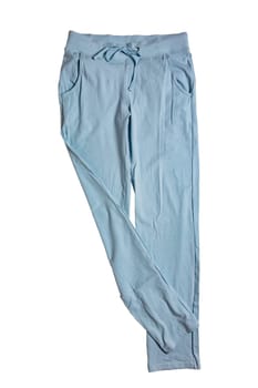 Sweat pants isolated. Close-up of womans fashionable blue casual trousers or jersey trousers isolated on a white background. Jogging outfit for workout. Clipping path.