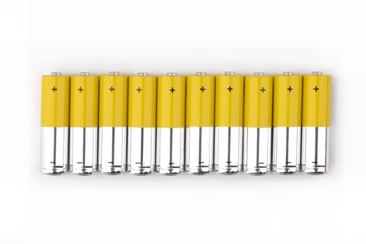 Batteries in a row isolated over white background
