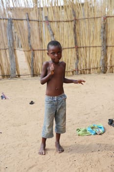 Hambukushu Tribe Boy at his Village near Divundu. Caprivi Strip. Namibia. Africa