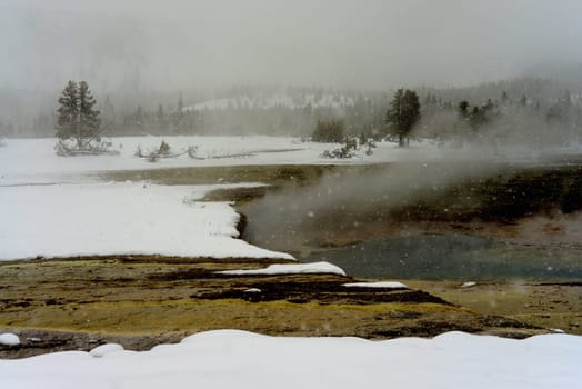 Geothermal pool in winter Yellowstone National Park