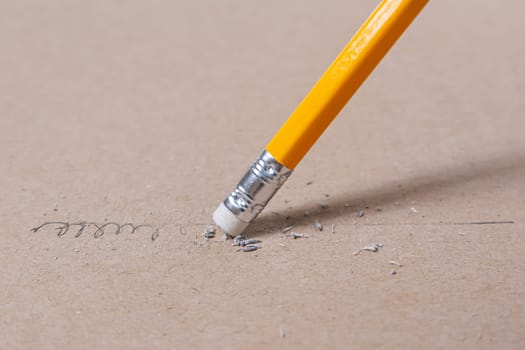 Close up a eraser pencil a straight line and crooked line, Mistake and Unsuccessful concept, Eraser pencil with brow paper