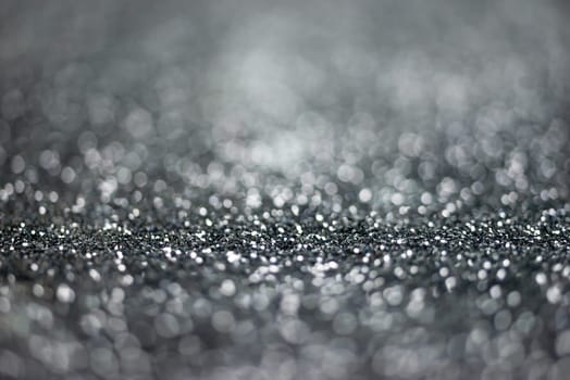 Glitter light abstract black bokeh light blurred background