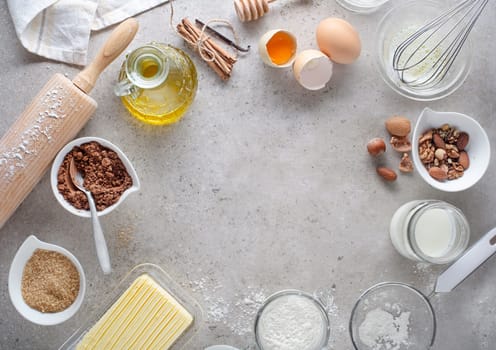 Baking and Cooking Ingredients and tools with flour eggs rolling pin butter sugar. Top View Copy Space