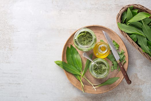 Making Fresh ramson or wild garlic pesto. Healthy spring food concept