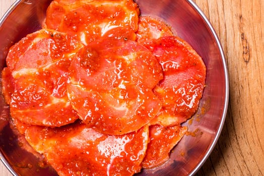 Raw pork on plate, Korean traditional style fresh pork beef belly BBQ, Japanese meat hot pot or Shabu in the restaurant, barbecue food