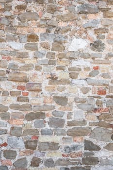 Antique natural stonewall. It can be used as texture and background.