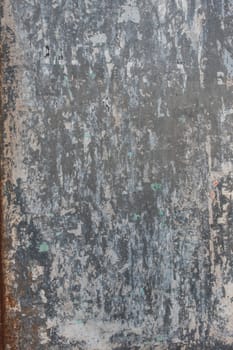 Rusted metal background, with torn pieces of paper.
