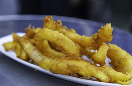 Fried squid rings in bars, restaurants and meals