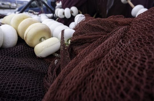 Fishing nets in maritime port, industry and work