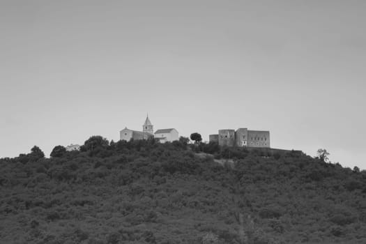 View of the hill on which stands the old castle Grobnik with the surrounding nature (Frankopanski kastel Grad Grobnik)