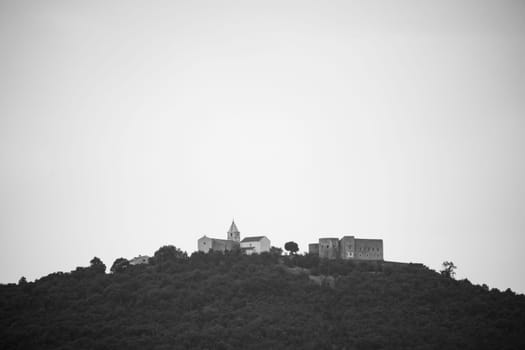 View of the hill on which stands the old castle Grobnik with the surrounding nature (Frankopanski kastel Grad Grobnik)