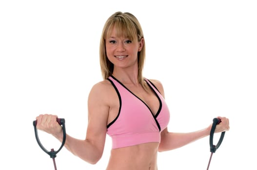 Pretty Young blond girl doing a fitness workout isolated over white