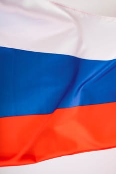 Waving colorful national flag of russia. Russian-Ukrainian conflict concept