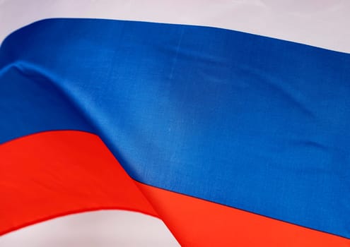 Waving colorful national flag of russia. Russian-Ukrainian conflict concept