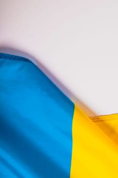 Flag of Ukraine. Blue and yellow colors. Close up shot, background