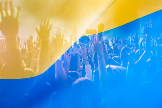 Flag of Ukraine, crowd in the background