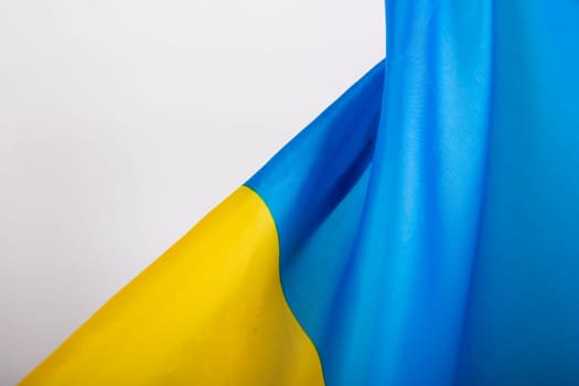 Flag of Ukraine. Blue and yellow colors. Close up shot, background