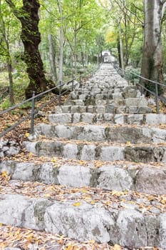 Holy Stairs. Avenue of the Chapels. Sanctuary of San Girolamo Emiliani. It is made up of one hundred and one steps: by going up on your knees, and reciting a prayer for each step, indulgence is obtained. Vercurago (LC), ITALY - November 1, 2019