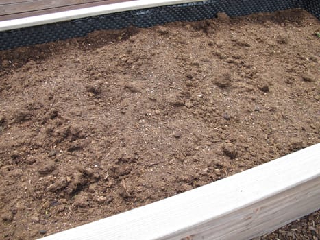 Raised bed refilled with fresh soil