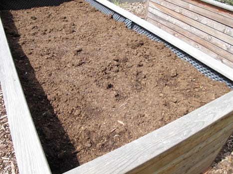 Raised bed refilled with fresh soil