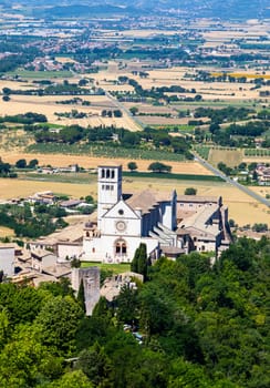 Assisi village in Umbria region, Italy. The town is famous for the most important Italian St. Francis Basilica (Basilica di San Francesco)