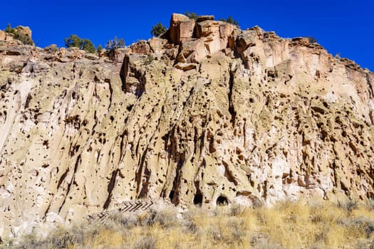 A view of the main cliff of Bandelier National Monument showing cave dwellings