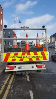 Highway maintenance open box truck. Rear view