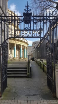Dublin, Ireland - Feb 9th, 2020: Wrought-iron door top detail of National Library of Ireland, Dublin