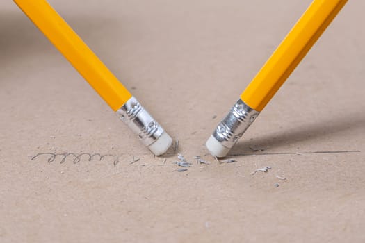 Close up a eraser pencil a straight line and crooked line, Mistake and Unsuccessful concept, Eraser pencil with brow paper