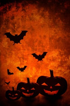 Halloween pumpkins and bats background