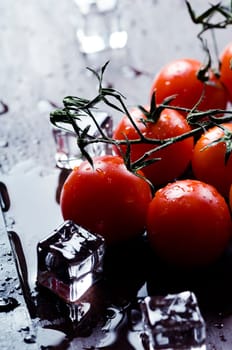 Cherry tomatoes and ice cubes