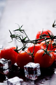 Cherry tomatoes and ice cubes