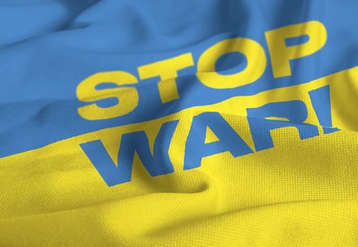Detail of the national flag of Ukraine with the "stop war"" text . Democracy and politics. Patriotism. Selective focus"