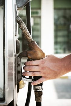 Man hand holding fuel pump