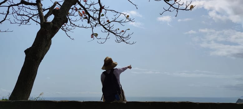 Hualien ocean of Taiwan. China. Beautiful blue sea with lush mountain and granite pebble beach