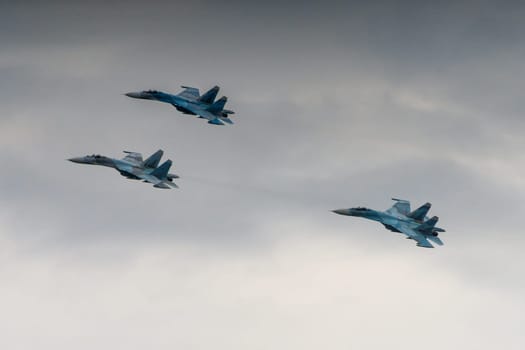 flight of three supersonic fighters SU 27 of the Russian Air Force in flight