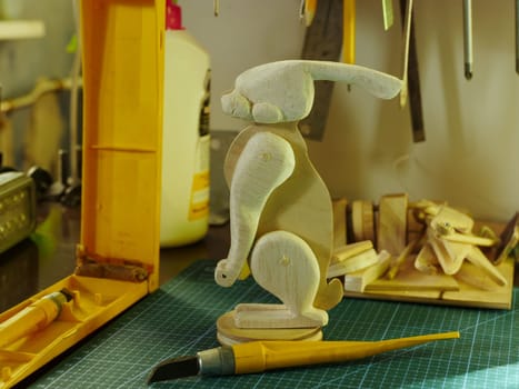 bunny wooden toy close-up, demonstration on the desktop