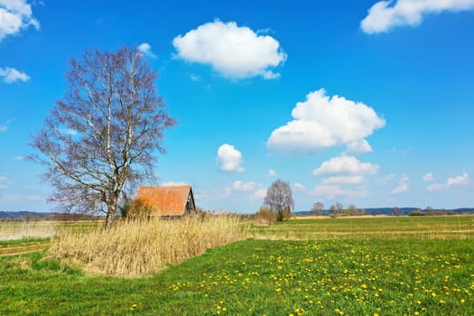 Agricultural hut on a dirt road