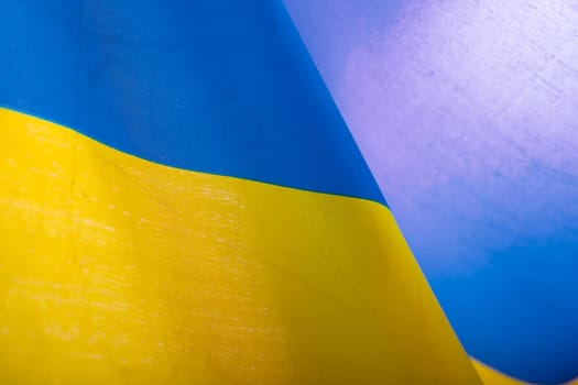 Flag of Ukraine. Blue and yellow colors. Close up shot, background